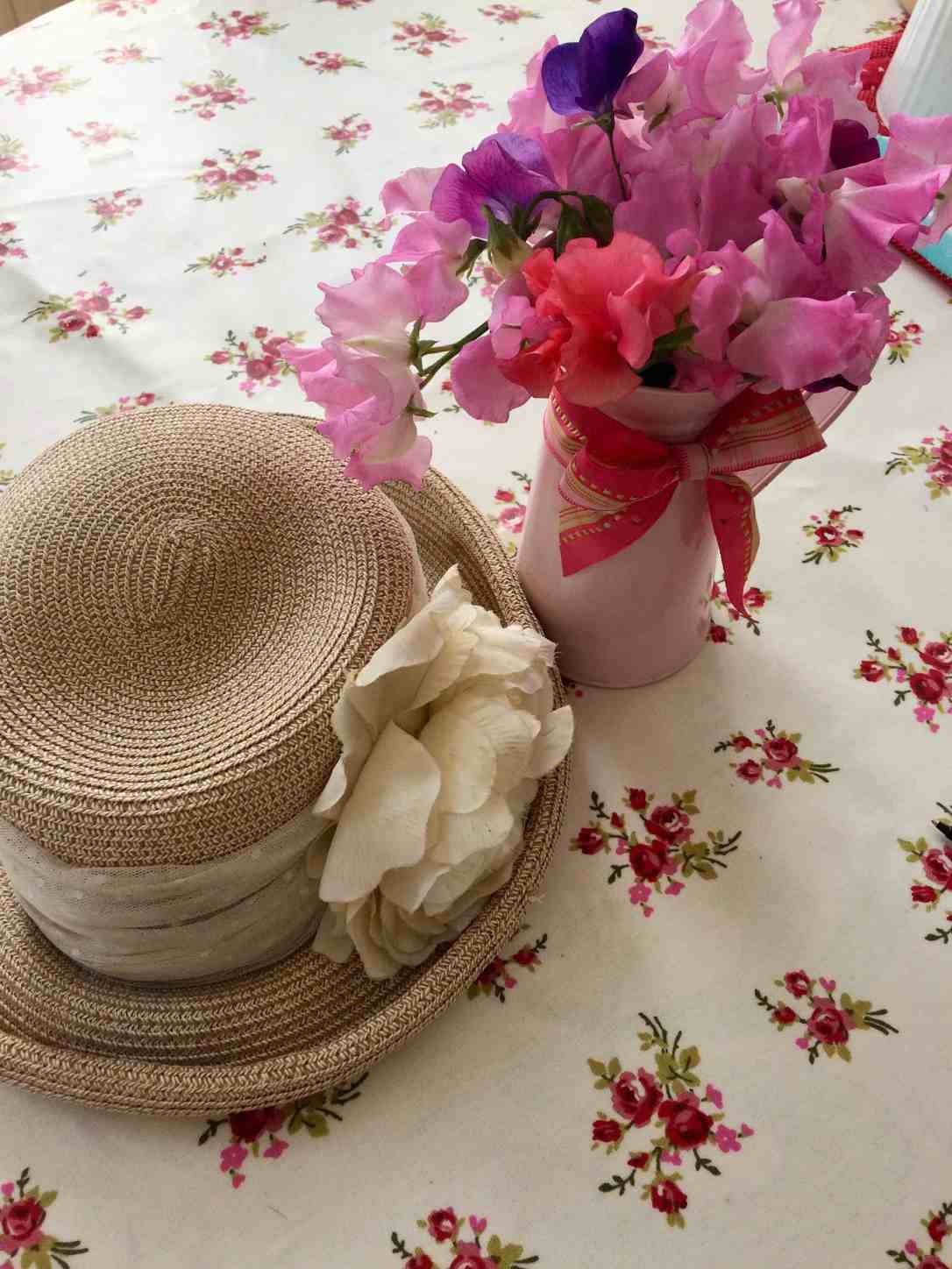 Sweet peas and summer hat